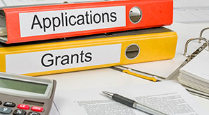 Postdoctoral Research Funding in Germany - An image of folders with the label applications and grant