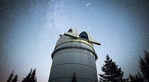 Image of Astronomical Observatory under the night sky stars